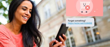 Person looking at their phone, with shopping cart icons overlaid on the image